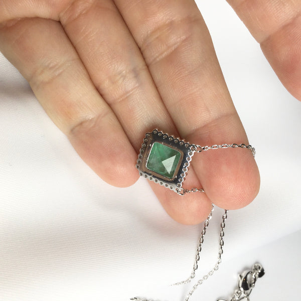 Delicate Square Emerald fusion necklace surround by small diamondettes.